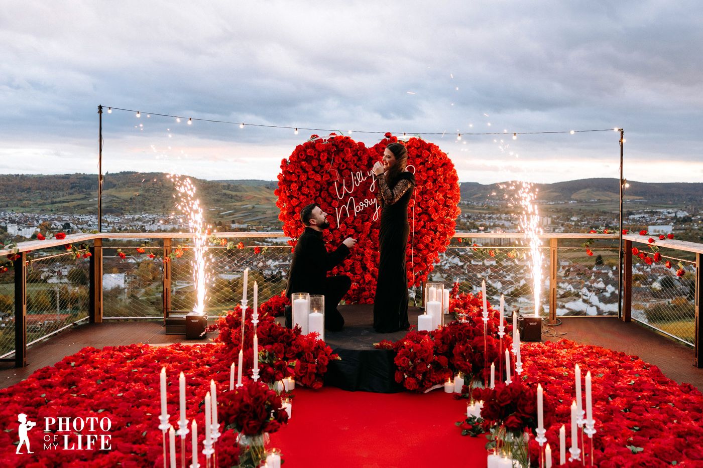 Power of Love proposal – red flower heart with man kneeling and fireworks