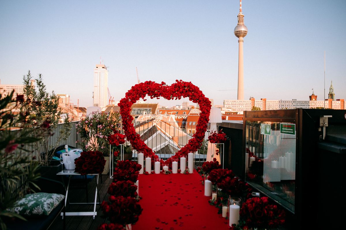 Marriage proposal in Berlin – TV Tower rooftop with red heart and Always Forever neon sign
